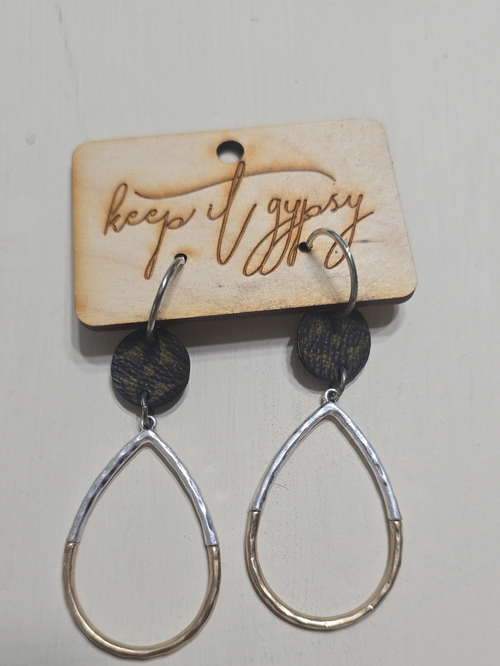 Two-Tone Teardrop Hoop Earrings in Black and Gold